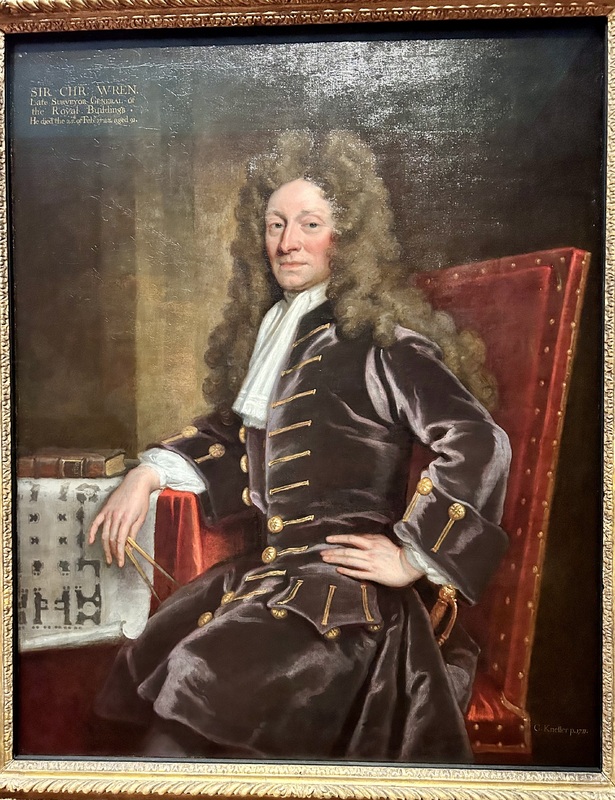A portrait of Sir Christopher Wren at the National Portrait Gallery in London. The caption to the portrait states he started practicing architecture in 1660, around the same time he helped the founding of the Royal Society. It also states how he helped design over 50 parish churches and St. Pauls. The portrait was painted to celebrate the completion of St. Paul's rebuild.