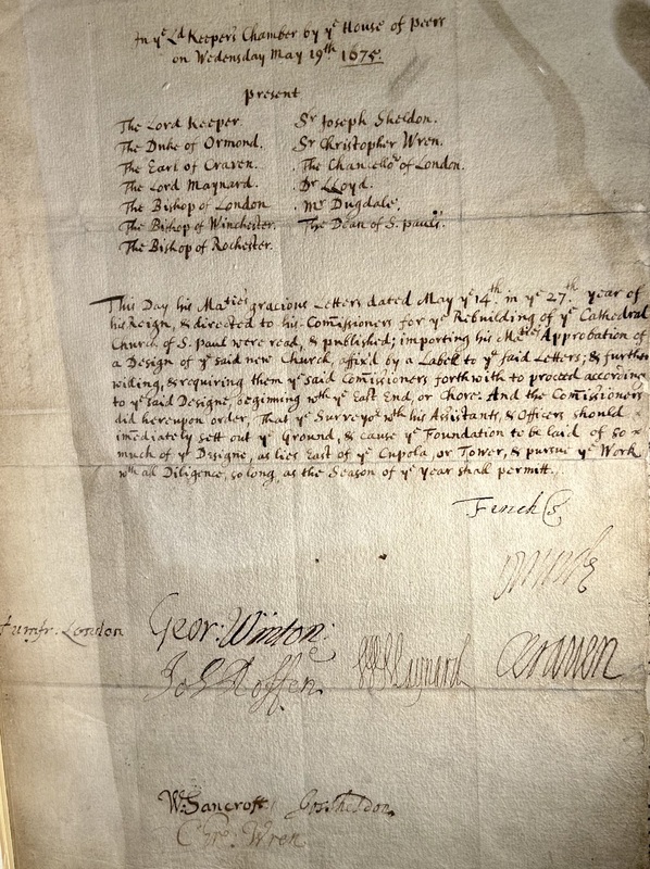 A legal document stating to move forward with the rebuilding of St. Paul's Cathedral. Sir Christopher Wren was one of the people who signed the document.&nbsp;
