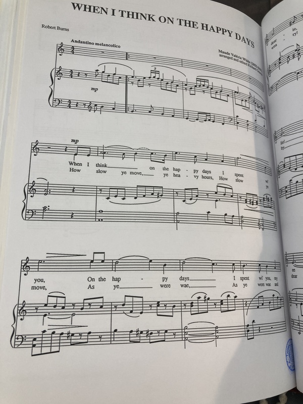 Picture of the first page of the second movement of Two Love Songs entitled "When I Think on Happy Days". It was composed by Maude Val&eacute;rie White and contains words by Robert Burns.