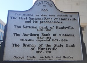 Sign out front of the First National Bank of Huntsville building posted by the Huntsville Historical Society in 1956