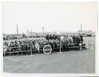 NASA personnel wait to greet President John F. Kennedy during his second visit to Huntsville.