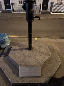 A photo of the water pump on Broad Street.