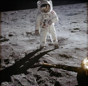 Astronaut Edwin Aldrin walks on lunar surface near leg of Lunar Module