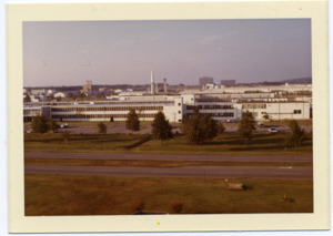 View of Marshall Space Flight Center with a Saturn I in the background.