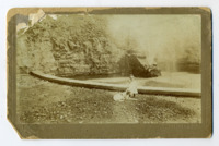 Photograph of W. C. Hutchens and his dog at Big Spring.