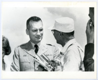 Photos of Colonel John C. Nickerson, Jr. with press.