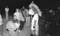 UAH mascot interacting with fans at the 1992 Homecoming bonfire.
