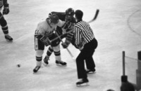 Hockey referee initiating the 1987 Homecoming game against Ohio University.