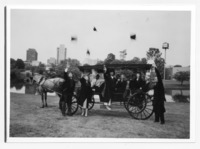 UAH graduates toss their caps in celebration in downtown Huntsville, Alabama.
