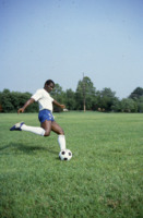 Men's soccer player in action on the UAH soccer field.