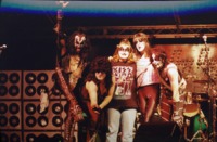 Fans posing with members of a KISS tribute band after their UAH show.