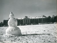 View of Morton Hall with a snowman in the foreground.