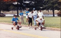 UAH faculty racing tricycles at 1993 Fall-Der-All.