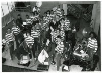 Members of the UAH Pep Band pose with their instruments.