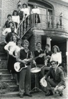 Musicians pose on the staircase at the Noojin House.