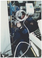 Jan Davis working in the Space Habitation Module on Space Shuttle <i>Discovery</i>.
