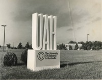 View of the UAH sign with Morton Hall in the background.