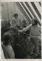 Students working in the campus greenhouse.