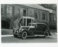Antique car parked at the entrance to the Noojin House.