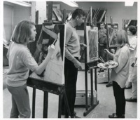 Art professor Jack Dempsey gives instruction in painting.