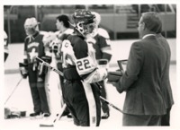 UAH hockey players on the ice.