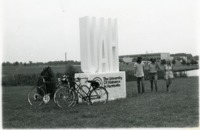 Students socialize at the UAH sign.