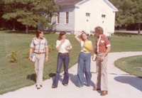 Students on campus walk past Union Grove Gallery.
