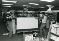 University bookstore employees move inventory.