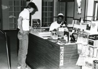 Student purchases books and supplies at the UAH bookstore.