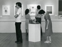 Spectators view an art show at Union Grove Gallery.