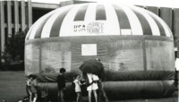 Children at the USA Space Bounce at the UAH alumni picnic held outside Madison Hall.