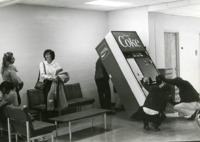 A new Coke machine arrives in the student lounge on the third floor of Morton Hall.