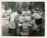 Wernher and Maria von Braun claim a table with son Peter at the 1969 MSFC employee picnic.