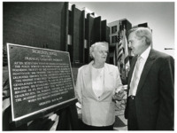 Frances Roberts and UAH president John Wright with the Roberts Hall dedication plaque.