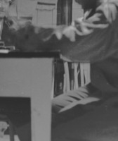 Close up photograph of two people at a table.