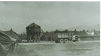 Photograph of a hospital truck on the road in the 95th Evacuation Hospital.
