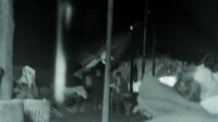 Photograph of people inside of a tent in the 95th Evacuation Hospital.