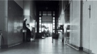 Photograph of people in the hallway at the 300th General Hospital in Naples, Italy.