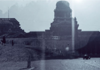 Photograph of a building and road outside of Rome, Italy.