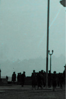 Photograph of people walking in Rome, Italy.