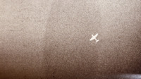 Photograph of an airplane in the sky.