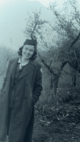 Photograph of a nurse outside in Italy.
