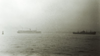 Photograph of ships leaving the New York Harbor.
