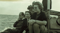Photograph of people on a boat trip, Great Britain.  