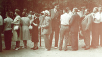 Jim Folsom mingles with the crowd at a 1946 gubernatorial campaign event at Monte Sano State Park.