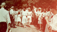Spectators gather around Jim Folsom at a gubernatorial campaign event at Monte Sano State Park.