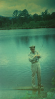 Unidentified National Guard officer fishing at a lake.