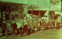 School children march past the Goodyear Tires on Washington St. in downtown Huntsville during a parade.
