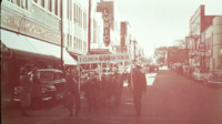 Students from E. Clinton Grammar School march in a parade on Washington St., downtown Huntsville.